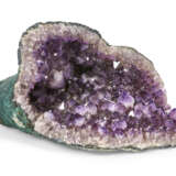 AN AMETHYST GEODE OF NATURAL FORM - photo 1