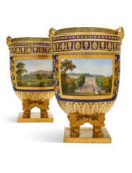 A PAIR OF SILVER-GILT MOUNTED SEVRES PORCELAIN BEAU BLEU GROUND ICE PAILS (GLACIERES A CHIMERES) FROM THE &#39;SERVICE A VUES DIVERSES&#39; COMMISSIONED BY NAPOLEON BONAPARTE AND DELIVERED TO LOUIS XVIII