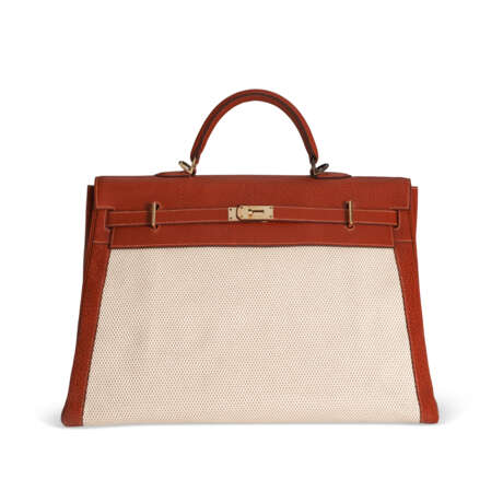 AN ÉTRUSQUE BUFFALO LEATHER & TOILE TRAVEL KELLY 50 WITH GOLD HARDWARE - photo 1