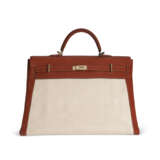 AN ÉTRUSQUE BUFFALO LEATHER & TOILE TRAVEL KELLY 50 WITH GOLD HARDWARE - photo 1