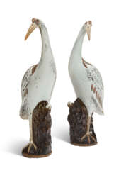 A LARGE PAIR OF CHINESE EXPORT PORCELAIN MODELS OF CRANES