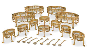 A SUITE OF FOUR VICTORIAN SILVER-GILT SWEETMEAT DISHES AND EIGHT SILVER-GILT SALT CELLARS