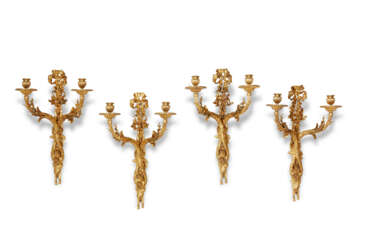 A SET OF FOUR FRENCH ORMOLU TWIN-BRANCH WALL-LIGHTS