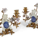 A PAIR OF LOUIS XV ORMOLU-MOUNTED CHINESE AND FRENCH PORCELAIN TWIN-BRANCH CANDELABRA - фото 1