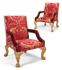 A PAIR OF GEORGE II GILTWOOD ARMCHAIRS