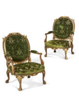 A PAIR OF GEORGE II MAHOGANY AND PARCEL-GILT ARMCHAIRS