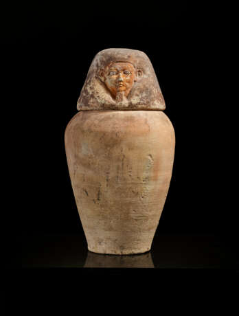 AN EGYPTIAN TERRACOTTA CANOPIC JAR FOR MENENA - Foto 1