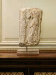 A ROMAN MARBLE ARCHAISTIC RELIEF WITH LETO