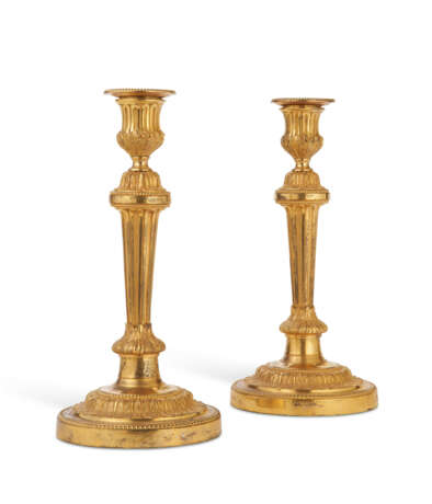 A PAIR OF LOUIS XVI ORMOLU CANDLESTICKS, MOUNTED AS LAMPS - фото 1