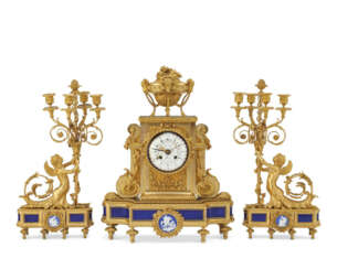 A FRENCH ORMOLU AND JASPERWARE THREE-PIECE CLOCK GARNITURE