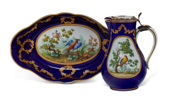 A SILVER-GILT MOUNTED SEVRES PORCELAIN 'BEAU BLEU' GROUND BALUSTER JUG AND HINGED COVER (POT 'A L'EAU TOURNE') AND AN ASSOCIATED LATER-DECORATED BASIN - фото 1