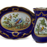 A SILVER-GILT MOUNTED SEVRES PORCELAIN 'BEAU BLEU' GROUND BALUSTER JUG AND HINGED COVER (POT 'A L'EAU TOURNE') AND AN ASSOCIATED LATER-DECORATED BASIN - photo 1