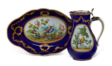 A SILVER-GILT MOUNTED SEVRES PORCELAIN 'BEAU BLEU' GROUND BALUSTER JUG AND HINGED COVER (POT 'A L'EAU TOURNE') AND AN ASSOCIATED LATER-DECORATED BASIN