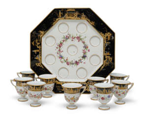 A SEVRES (HARD PASTE) PORCELAIN BLACK-GROUND OCTAGONAL ICE-CUP TRAY AND NINE ICE-CUPS