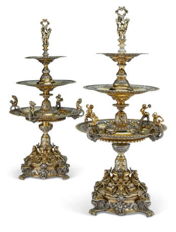 A PAIR OF VICTORIAN PARCEL-GILT SILVER THREE-TIER EPERGNES - фото 1
