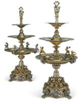 A PAIR OF VICTORIAN PARCEL-GILT SILVER THREE-TIER EPERGNES