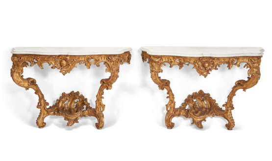 A MATCHED PAIR OF LOUIS XV GILTWOOD CONSOLE TABLES - photo 1
