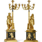 A PAIR OF RESTAURATION ORMOLU AND PATINATED BRONZE FIVE-LIGHT CANDELABRA - photo 1