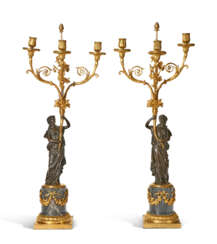 A PAIR OF LOUIS XVI ORMOLU, PATINATED-BRONZE AND BLEU TURQUIN MARBLE THREE-LIGHT CANDELABRA