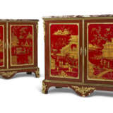 A PAIR OF FRENCH ORMOLU-MOUNTED MAHOGANY AND RED-LACQUERED SIDE CABINETS - photo 1