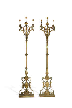 A PAIR OF FRENCH GILT-BRONZE AND POLISHED BRASS THREE-LIGHT TORCHERES - фото 1