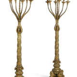 A PAIR OF RENAISSANCE STYLE GILT-METAL SEVEN-LIGHT TORCHERES - photo 1