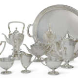 AN AMERICAN SILVER SEVEN-PIECE TEA AND COFFEE SERVICE AND MATCHING SILVER-PLATED TWO-HANDLED TRAY - фото 1