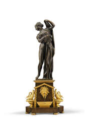 AN EMPIRE PATINATED BRONZE FIGURE OF THE CALLIPYGEAN VENUS ON A RUSSIAN ORMOLU AND PATINATED BRONZE BASE