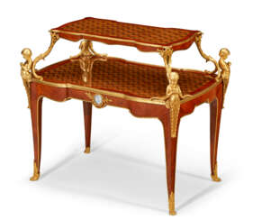 A FRENCH ORMOLU AND JASPERWARE-MOUNTED SATINWOOD, HAREWOOD AND AMARANTH PARQUETRY TEA TABLE