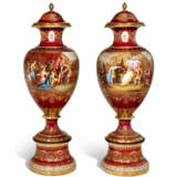 A LARGE PAIR OF ORMOLU-MOUNTED VIENNA STYLE PORCELAIN CLARET-GROUND VASES, COVERS AND STANDS - photo 1