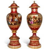 A LARGE PAIR OF ORMOLU-MOUNTED VIENNA STYLE PORCELAIN CLARET-GROUND VASES, COVERS AND STANDS - photo 2