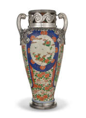 A FRENCH SILVER-MOUNTED PORCELAIN VASE