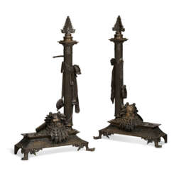 A PAIR OF NAPOLEON III PATINATED BRONZE CHENETS