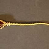 A gold fibula with an almandine - photo 1