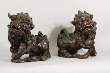 A pair of Chinese wooden Fo Lions