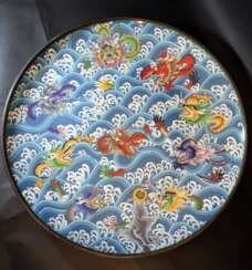 Large Asian cloisone plate with multicoloured enamel decorated with dragons