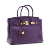 AN ULTRA VIOLET CLÉMENCE LEATHER BIRKIN 35 WITH GOLD HARDWARE - photo 2