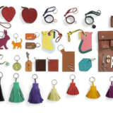 A GROUP OF TWENTY-SEVEN: ONE SEWING KIT, ONE SWISS ARMY KNIFE, TWO LARGE EPSOM LEATHER HORSEHEAD 'CAMAIL' KEY RINGS, SIX LEATHER 'CARMEN' KEY RINGS, THREE STUDDED KEY RINGS, TEN KEY RINGS, TWO COIN POUCHES, ONE BOOK MARK, & ONE CHARM - photo 1