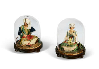 A PAIR OF EARLY VICTORIAN TINTED-WAX &#39;TURKISH&#39; FIGURES