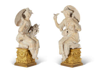 A PAIR OF FRENCH TERRACOTTA CHINOISERIE FIGURES ON ORMOLU BASES