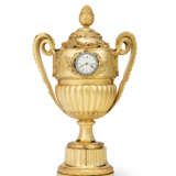 A GEORGE III ORMOLU, SILVER AND PASTE-SET VASE TIMEPIECE TABLE CLOCK - фото 1