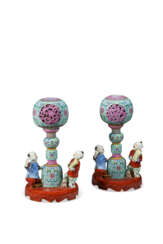 A PAIR OF CHINESE TURQUOISE-GROUND FAMILLE ROSE HAT STANDS