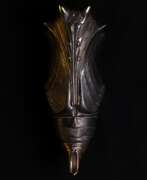 Bronze. Puparia