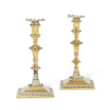 A PAIR OF GEORGE III SILVER-GILT TAPERSTICKS - photo 1