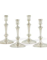 A PAIR OF QUEEN ANNE SILVER CANDLESTICKS AND TWO EN SUITE