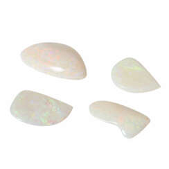 4 Opale in Freiform zus. ca. 33 ct,