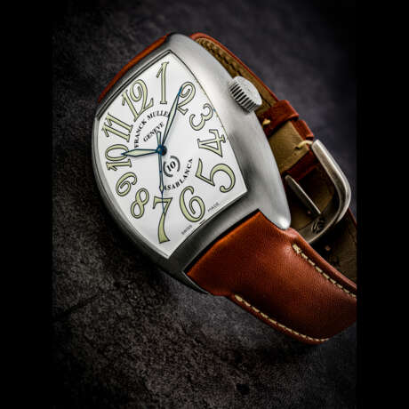 FRANCK MULLER. AN EXTREMELY RARE AND LARGE STAINLESS STEEL LIMITED EDITION TONNEAU-SHAPED AUTOMATIC WRISTWATCH WITH SWEEP CENTRE SECONDS - фото 1