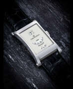 Jump Hour. CHRONOSWISS. AN 18K WHITE GOLD LIMITED EDTION WRISTWATCH WITH JUMP HOUR, WANDERING SECONDS AND MINUTES