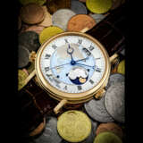 BREGUET. AN 18K PINK GOLD AUTOMATIC WORLD TIME WRISTWATCH WITH DATE AND DAY/NIGHT INDICATION - Foto 1