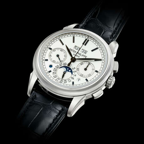 PATEK PHILIPPE. AN 18K WHITE GOLD PERPETUAL CALENDAR CHRONOGRAPH WRISTWATCH WITH MOON PHASES, LEAP YEAR AND DAY/NIGHT INDICATION - photo 2